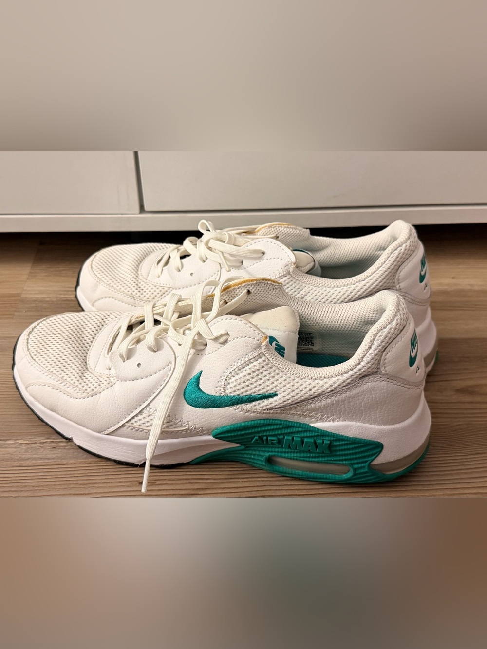 Nike Women’s White Sneakers with Teal Accents Size 10